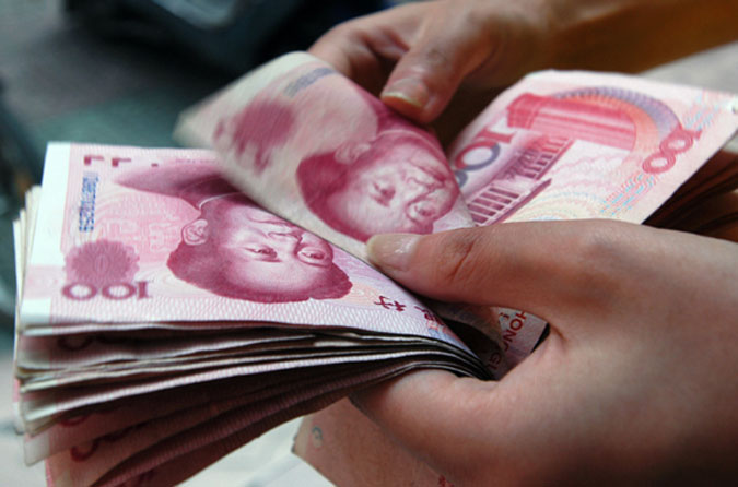 Economia chinesa mantém crescimento de 7,7% em 2013